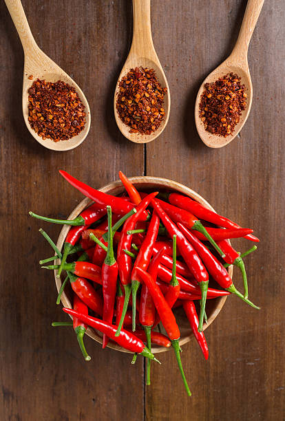 istock red Chili peppers on wooden background 485704050