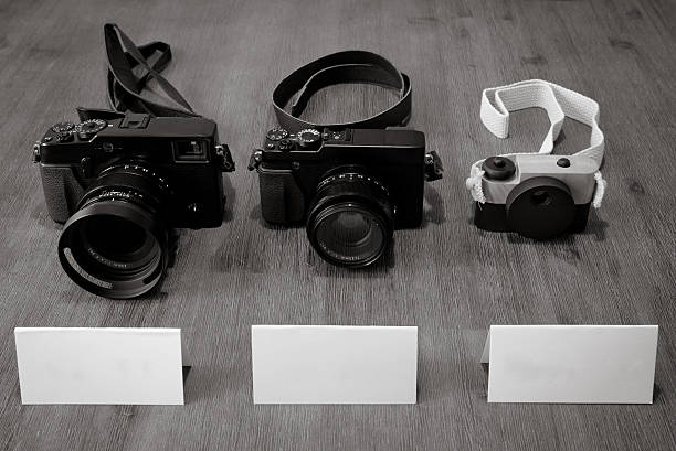 istock Pregnancy announcement with vintage cameras plus blank notes. 485704944