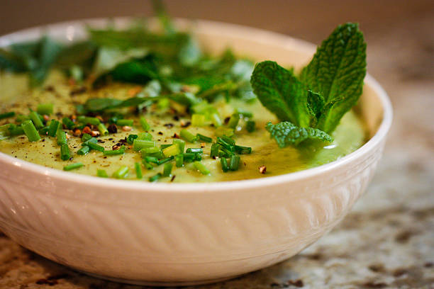 Pea and Parsnip Vichyssoise (thick soup) with Tarragon stock photo