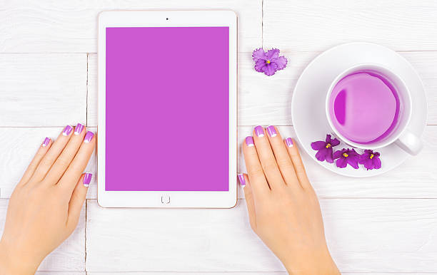 istock french manicure with violet flowers. spa 485711092