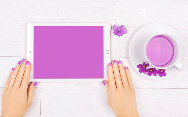 istock french manicure with violet flowers. spa 485711096