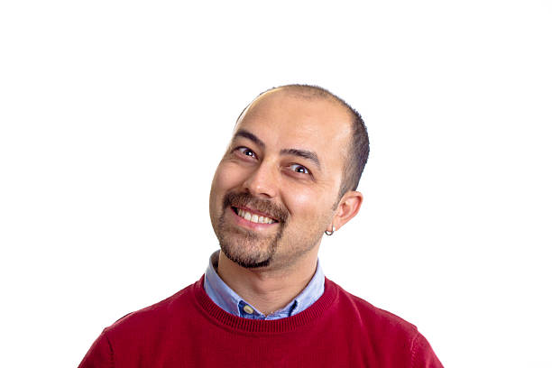 istock happy young man smiling at the camera isolated 485712736
