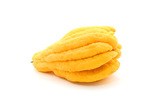 Buddha's hand or fingered citron fruit isolate on white