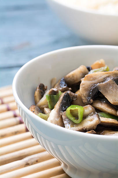 istock mushroom dish in a white bowl on a bamboo mat 485715486