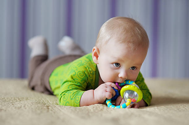 istock Baby play with toy 485716148