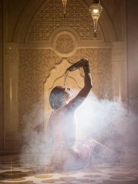 Woman bathed in turkish bath