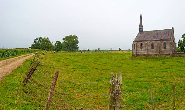 istock Church in a field in summer 485716614