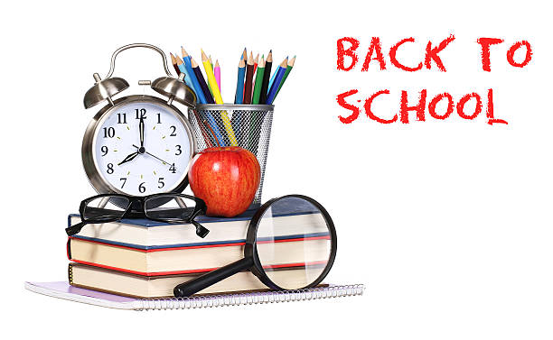 istock Books, apple, clock and pencils isolated on white background. Text 485716658