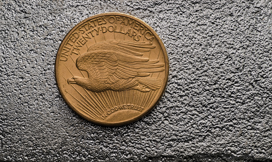 US Gold Coin Saint-Gaudens Double Eagle on SIlver Bar