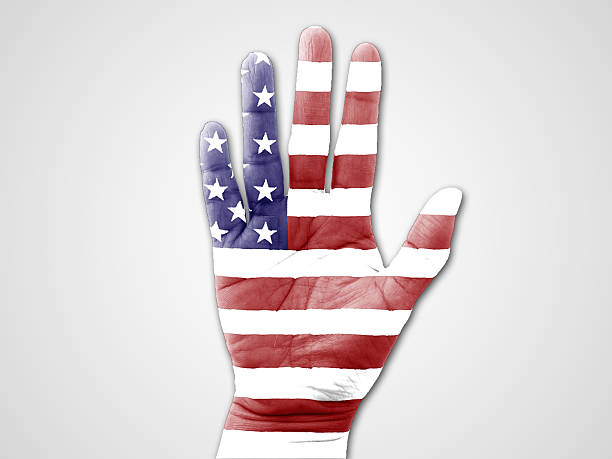 istock American flag on hand with a white background. 485719970