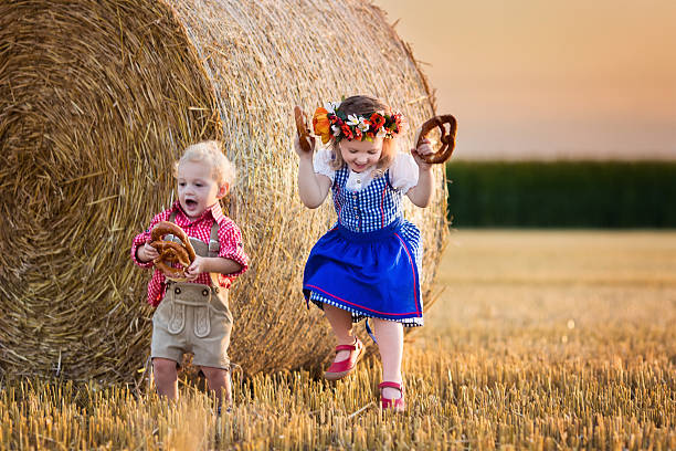 istock Kids playing in wheat field in Germany 485720402