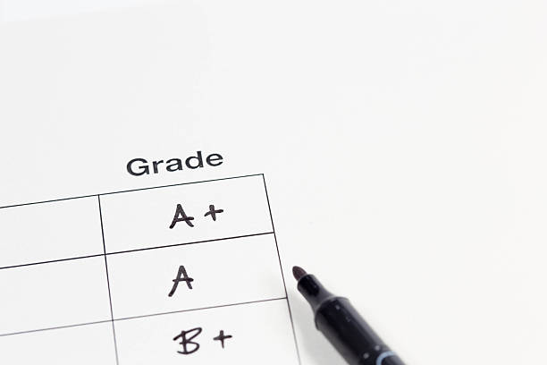 Grades Grades on Isolated Excellent  business teaching student writing stock pictures, royalty-free photos & images