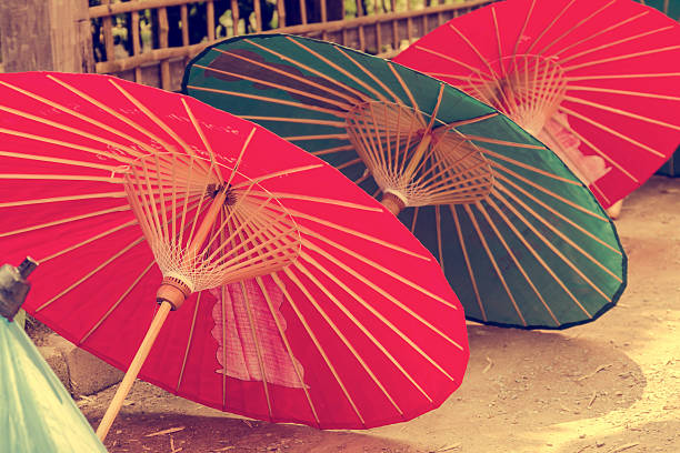 istock Thai traditional clothes umbrella 485723626