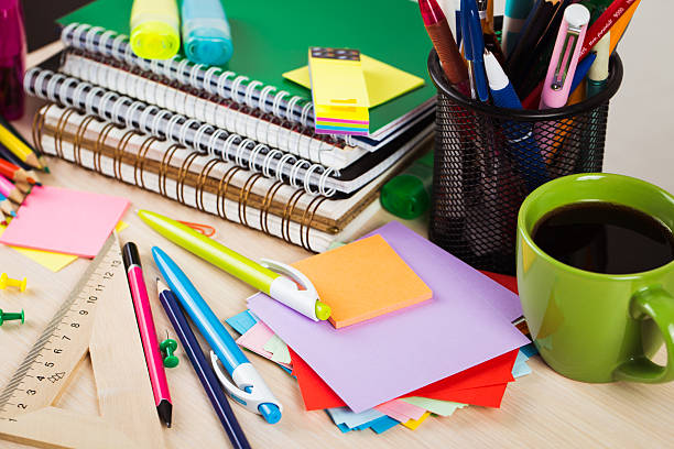 istock School and office accessories on wooden background 485725204