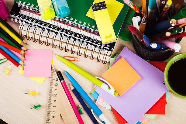 istock School and office accessories on wooden background 485725206