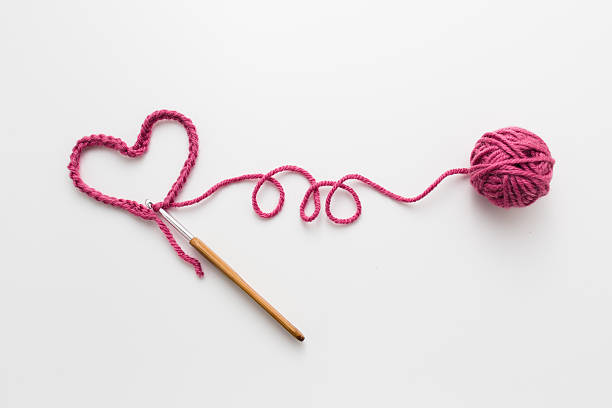 Love Crochet Crochet hook and yarn skein stock pictures, royalty-free photos & images