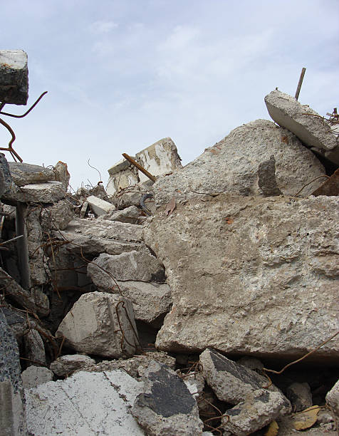 istock large concrete chunks with twisted metal on a demolition site 485725926