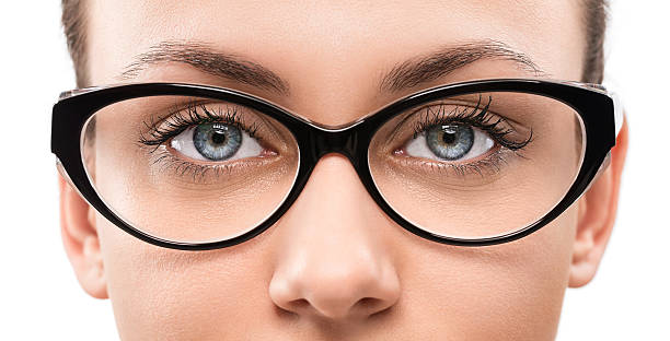 eyewear - blaue augen stock-fotos und bilder