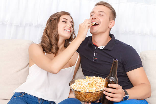 istock Nice young couple sitting on the couch 485729628