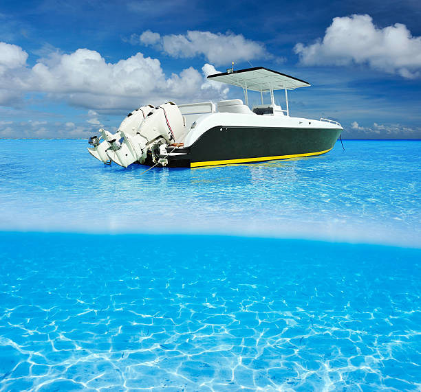 istock Beach and motor boat with white sand bottom underwater view 485732003