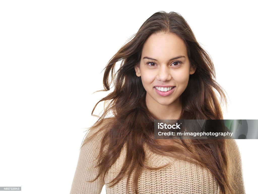 Close up portrait of a happy young woman smiling Close up portrait of a happy young woman smiling with hair blowing isolated on white 20-29 Years Stock Photo