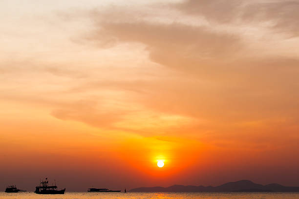 istock sunset boat in Thailand. 485732559