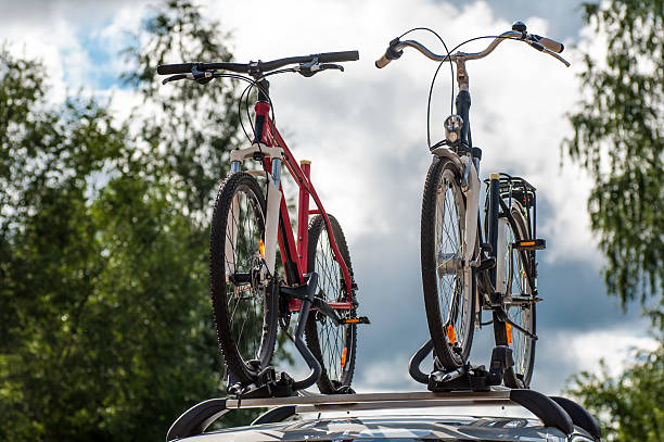 istock two bikes on the trunk of  car 485733849