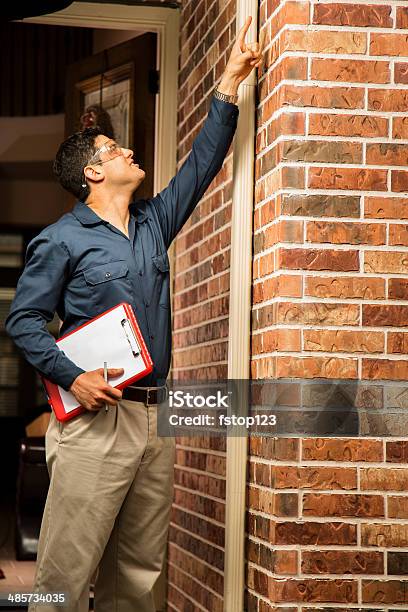 Service Industry Repairman Or Inspector Outside A Home Stock Photo - Download Image Now