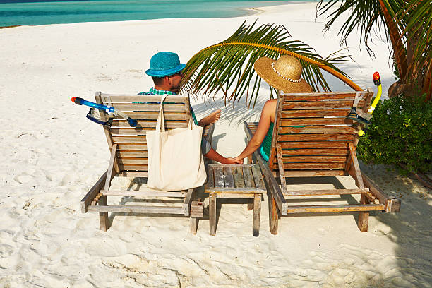 istock Couple in green on a beach at Maldives 485735821