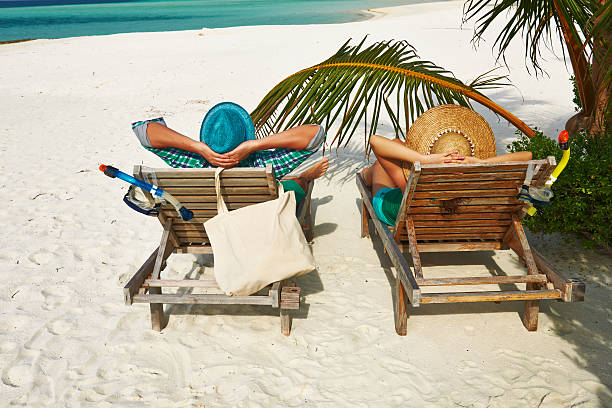 istock Couple in green on a beach at Maldives 485735831