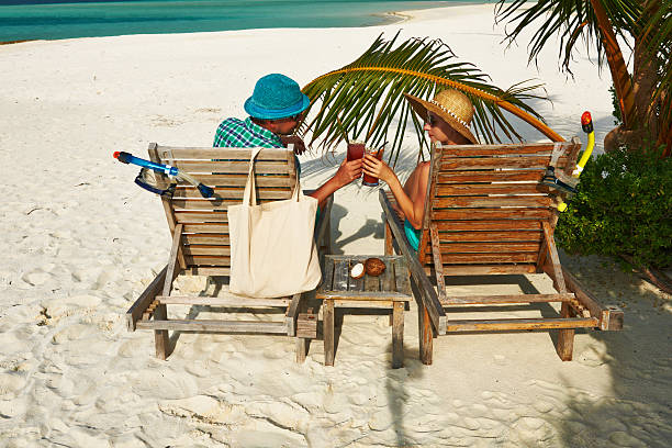 istock Couple in green on a beach at Maldives 485736123