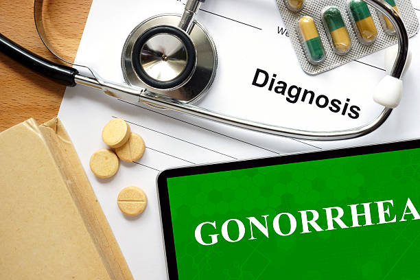 istock Word Gonorrhea  on a paper and pills 485736396