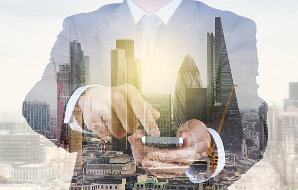 istock Double exposure of success businessman using smart phone 485736856