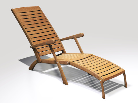 Wooden lawn chair (deck chair) on white background.
