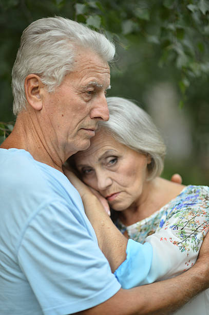 istock Sad senior couple in  park 485737790