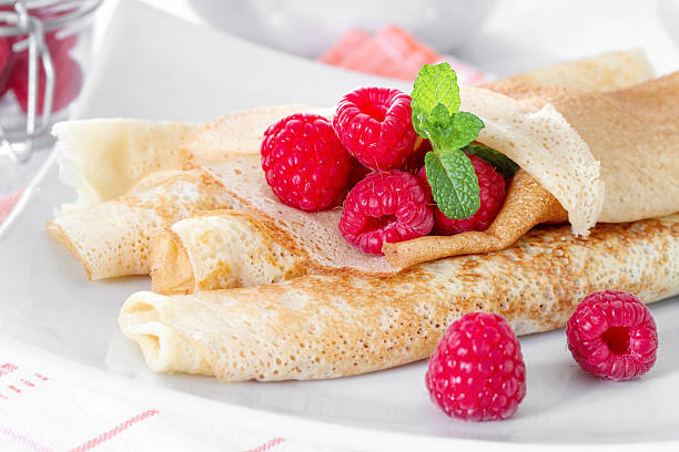 istock Homemade pancakes with raspberries and mint 485738701
