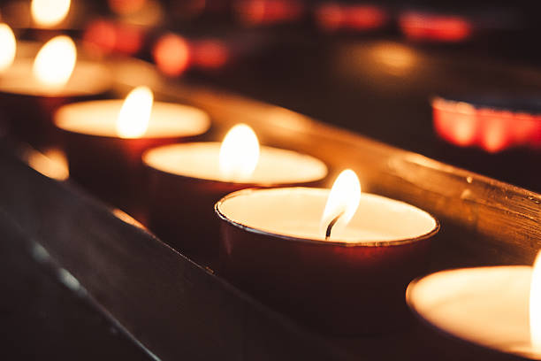 row of candles stock photo