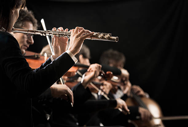 istock Classical music concert: flutist close-up 485741912
