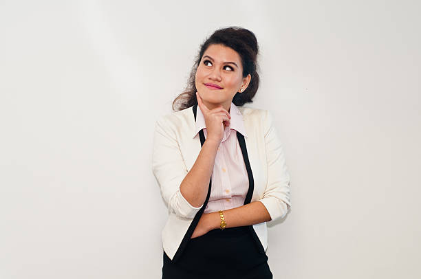 istock Business woman is thinking standing on white background 485742112