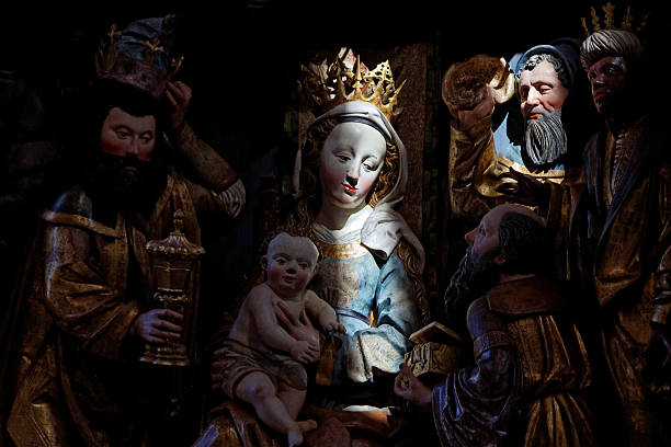 istock old medieval altar with St. Mary in sunbeam 485745048