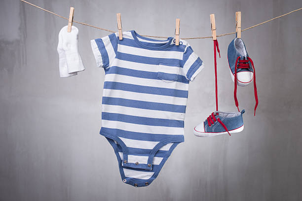 istock Baby clothes hanging on the clothesline 485745180