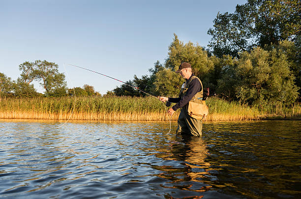 istock Fly Fisherman Casting Out His Line 485746324