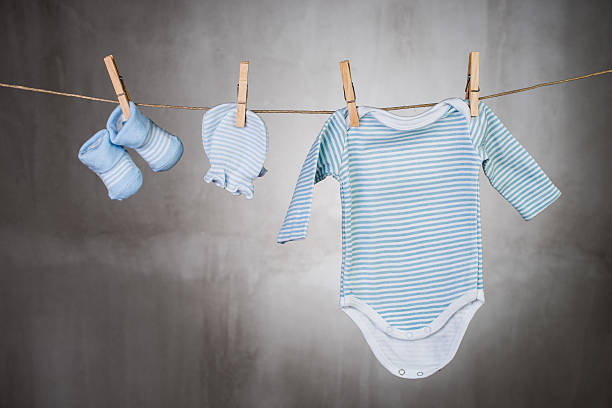 istock Baby clothes hanging on the clothesline 485746374