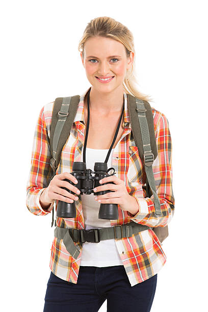 istock female hiker holding binoculars 485750888