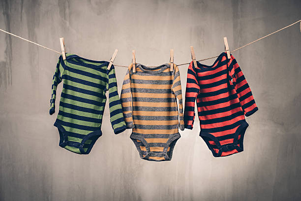 istock Colorful baby goods hanging on the clothesline 485751114
