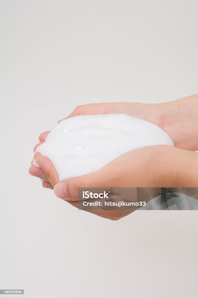 Soap on female hand Bubble Stock Photo
