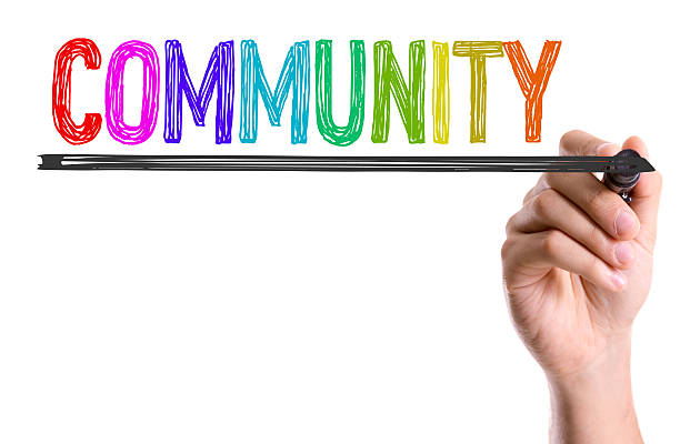 istock Hand with marker writing the word Community 485752172
