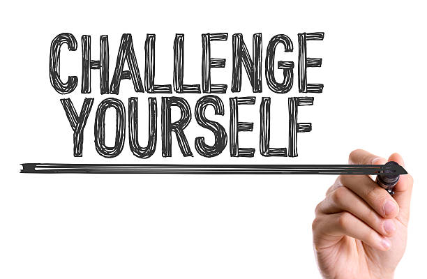 istock Hand with marker writing the word Challenge Yourself 485752176