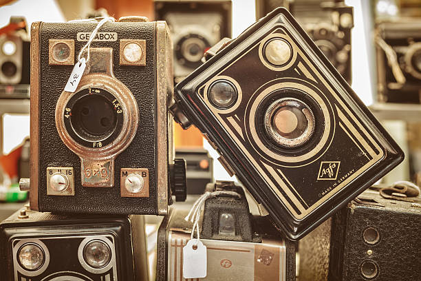 Doesburg, The Netherlands - August 23, 2015: Sepia toned image of old box cameras on a flee market in Doesburg, The Netherlands