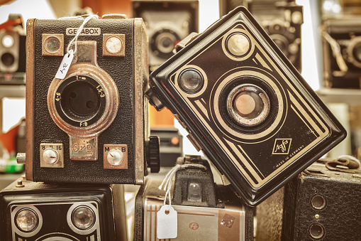 Doesburg, The Netherlands - August 23, 2015: Sepia toned image of old box cameras on a flee market in Doesburg, The Netherlands